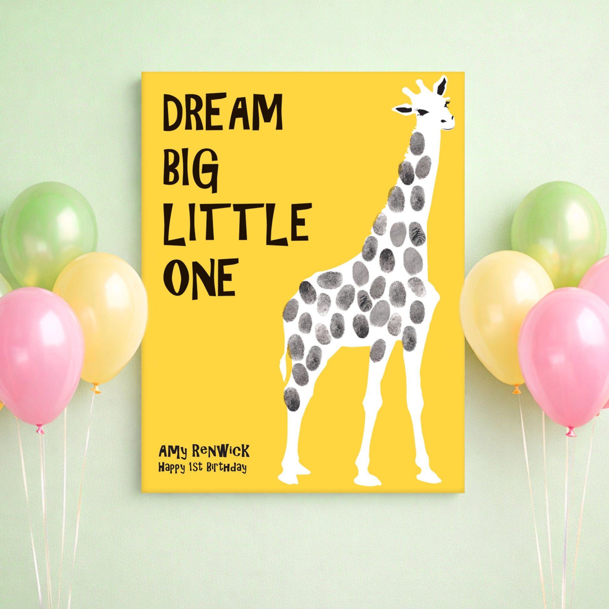 Canvas print with a giraffe illustration and text 'Dream Big Little One' on a yellow background, surrounded by balloons.
