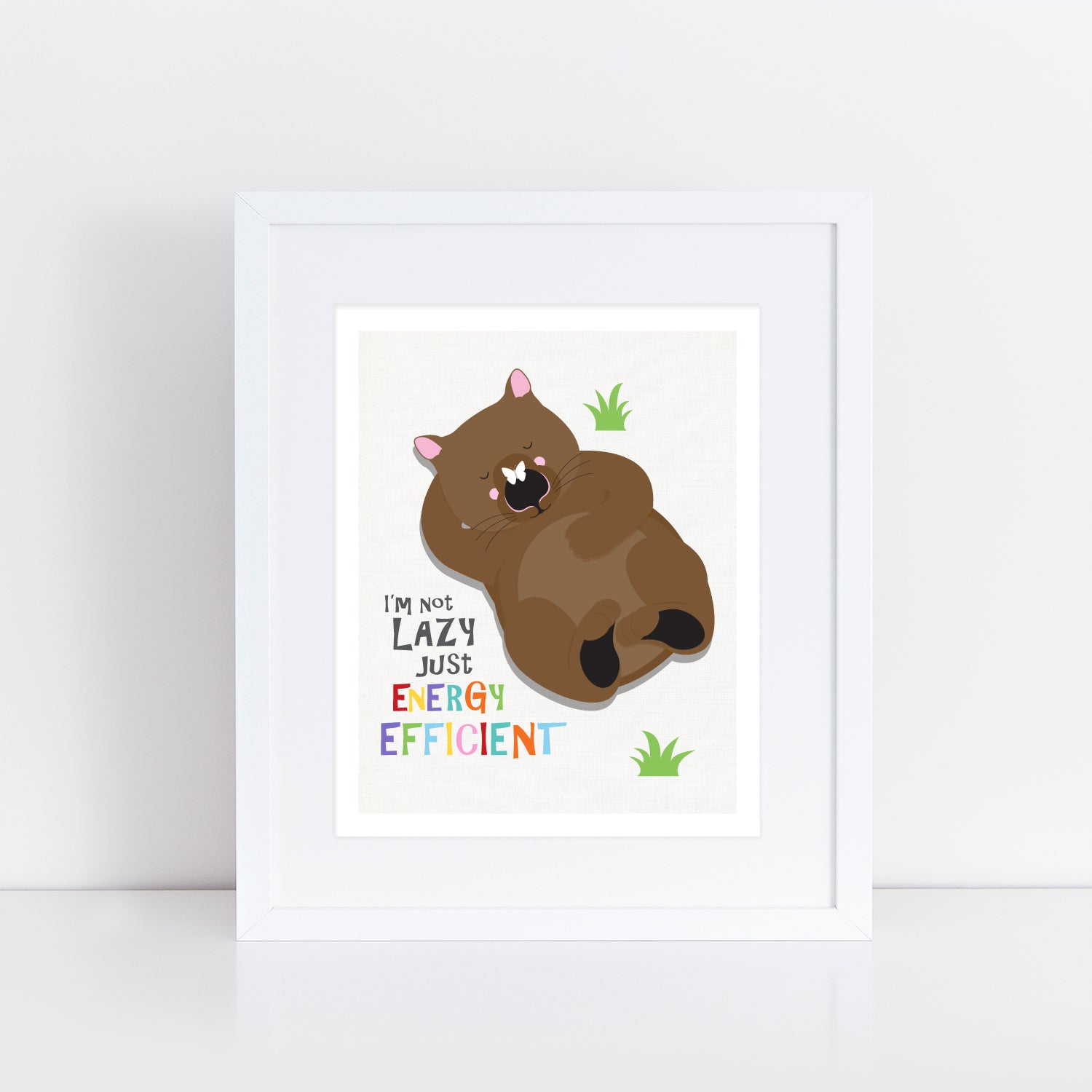 print of a wombat Lying around with a butterfly on it's nose and the cute quote "I'm not lazy just energy efficient."