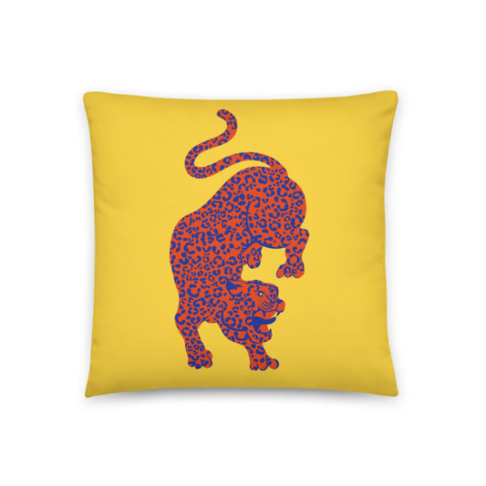 vibrant cushion cover features a striking yellow backdrop to a bold design of an orange and blue leopard