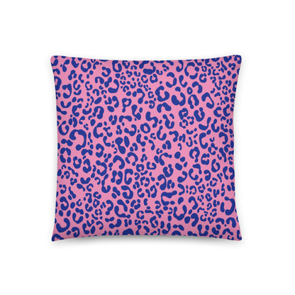 vibrant pink and blue cushion cover features a striking leopard print