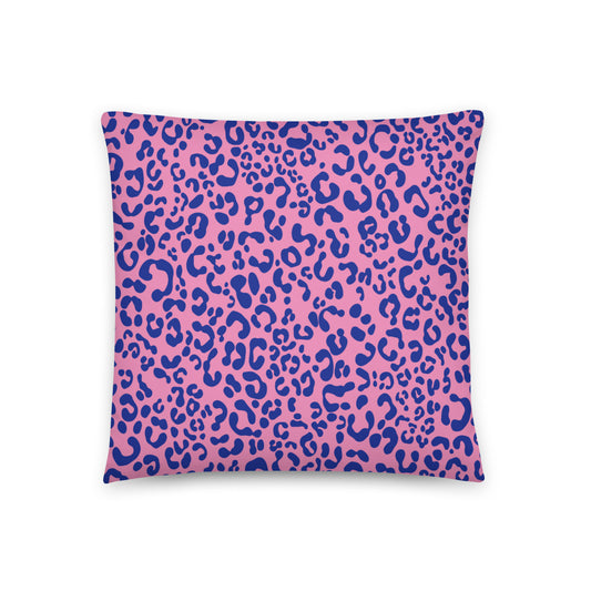 vibrant pink and blue cushion cover features a striking leopard print