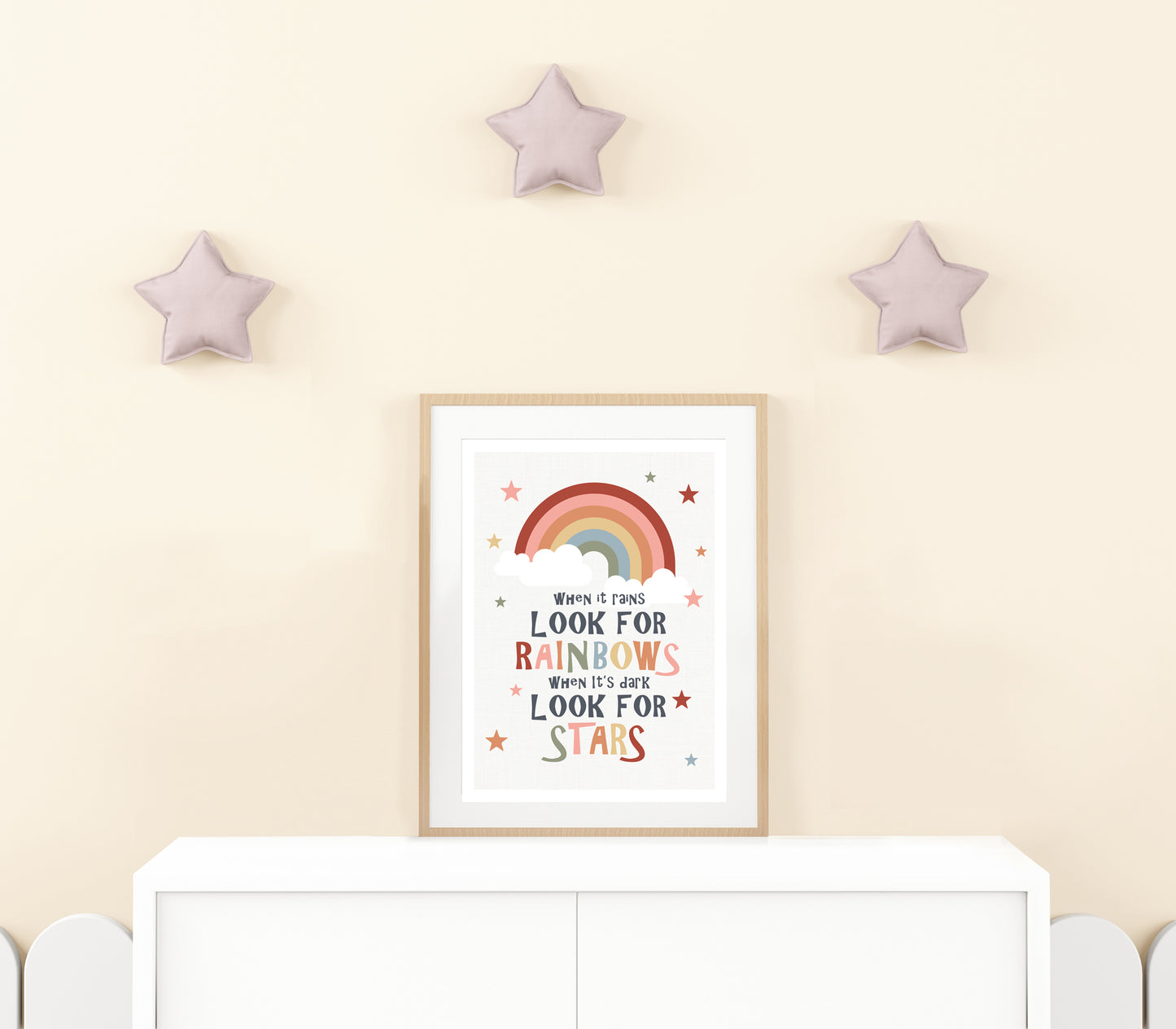 Look for rainbows art earth toned print in yellow nursery