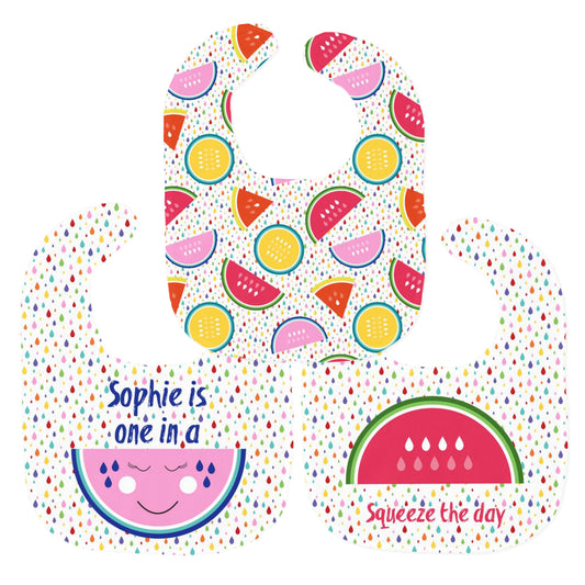 Fruity themed baby bib set, vibrant fruit pattern bib, a personalised “One in a Melon” bib and a “Squeeze the Day” bib with a cheerful watermelon design.