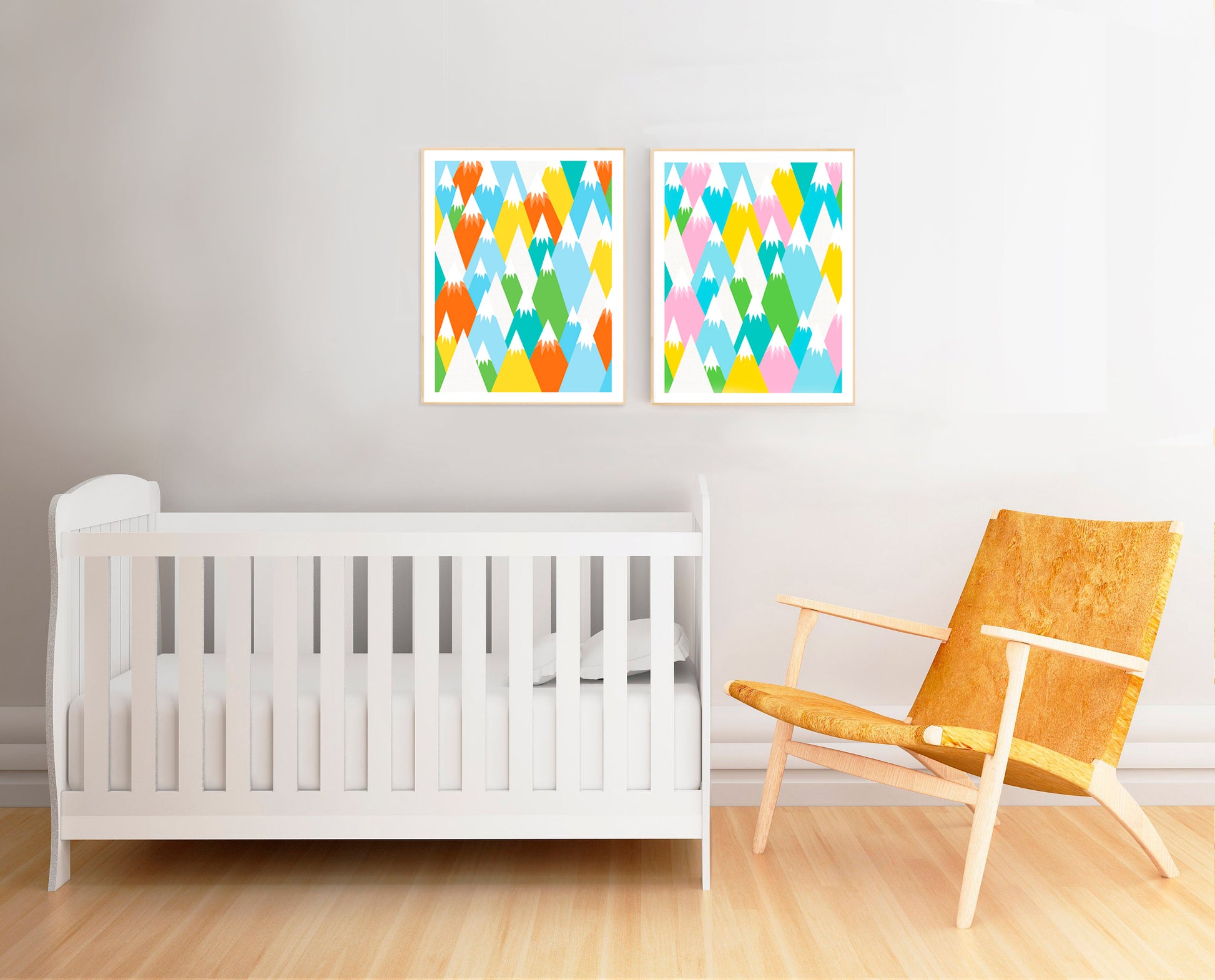 nursery with chair and crib and colourful snowy mountain prints