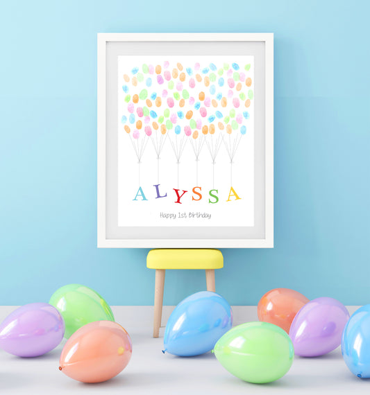 childs name being lifted up by colorful balloons on a poster in a frame at a party