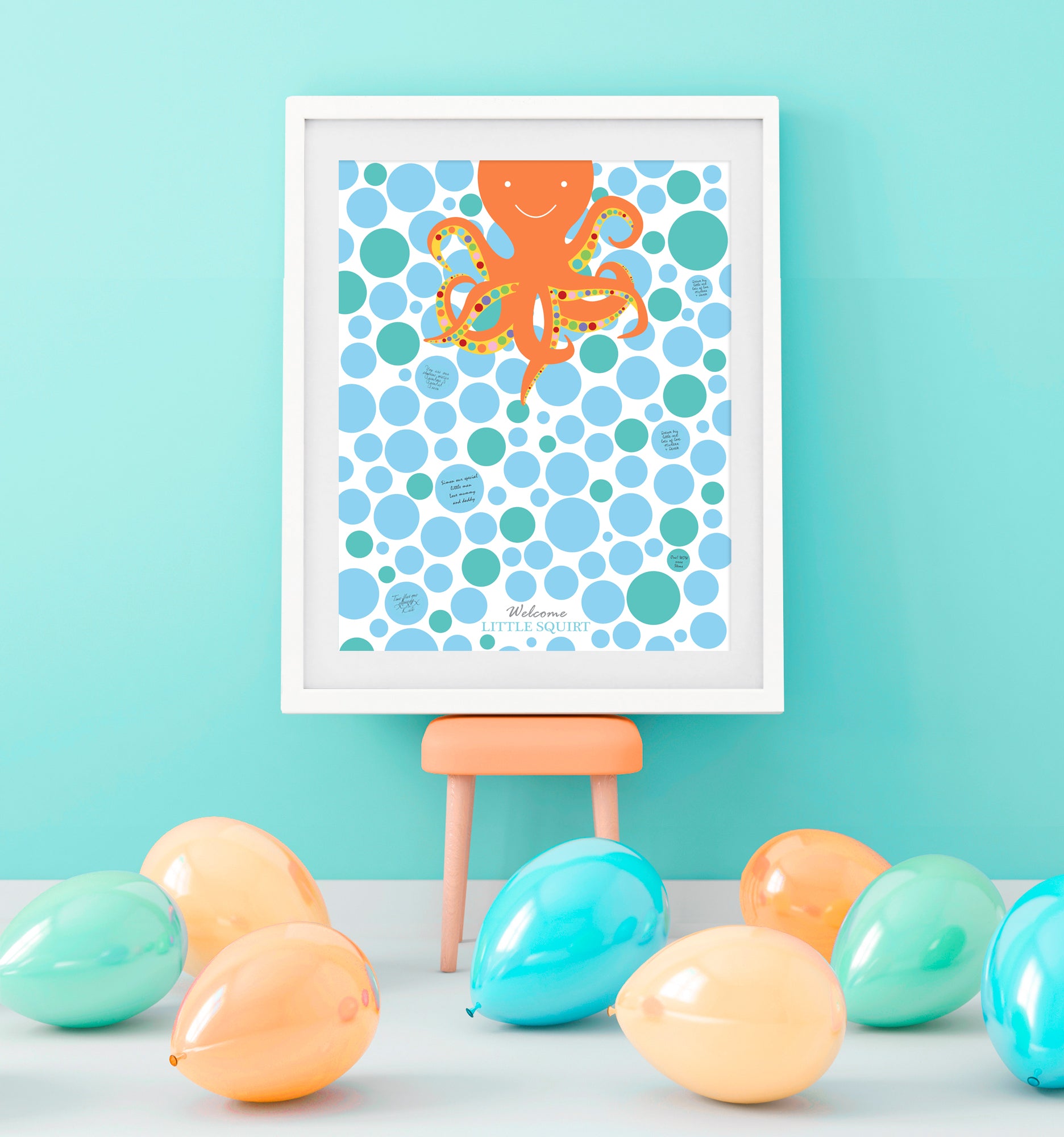 octopus print framed at a baby shower party in turquoise room with balloons