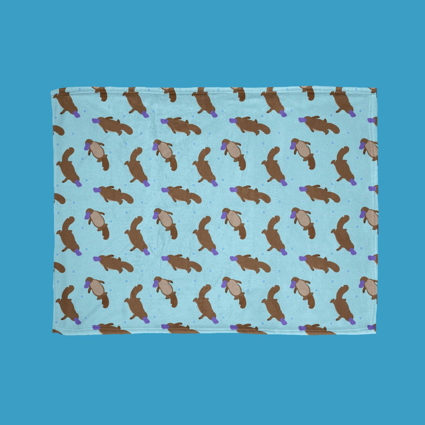 Playful platypus throw blanket