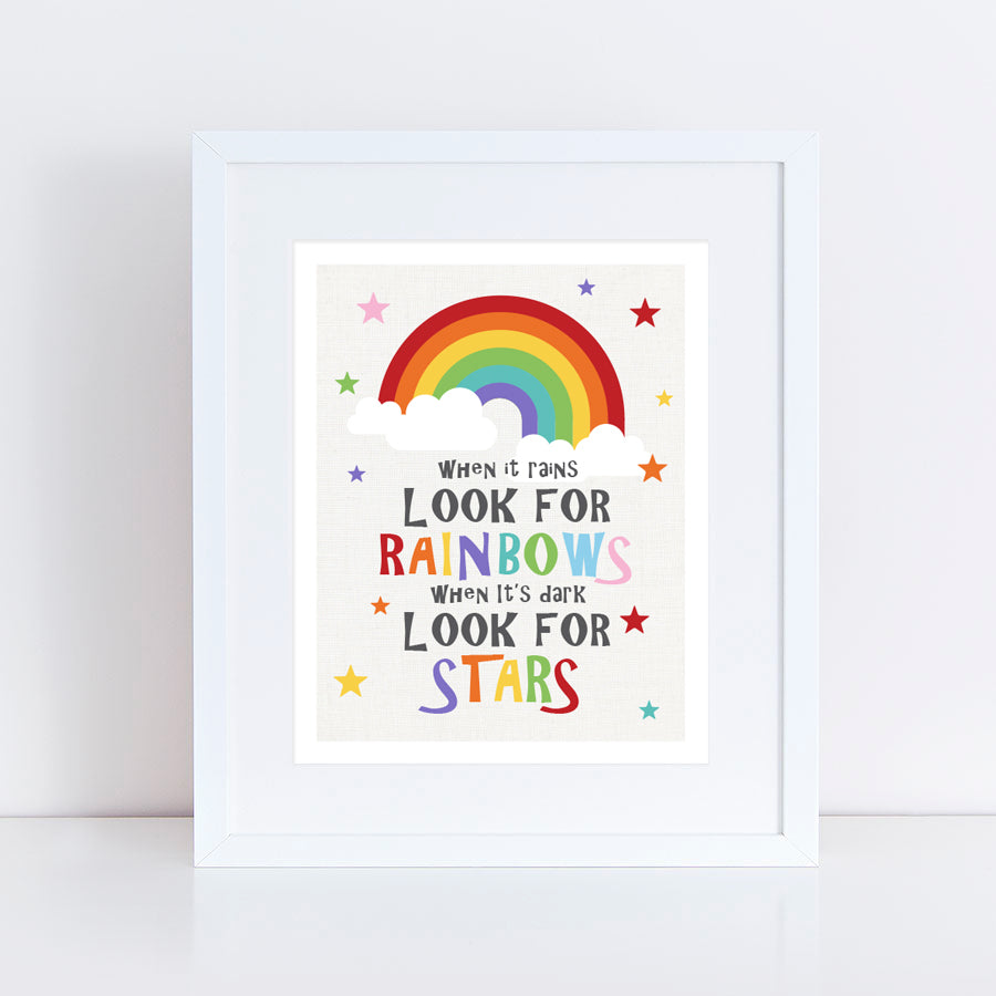 Bright colourful print with positive quote look for rainbows
