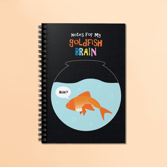 Notebook with goldfish illustration and text that reads Notes for my goldfish brain