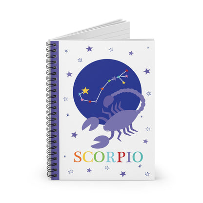 Scorpio zodiac spiral notebook slightly open showing ruled pages inside