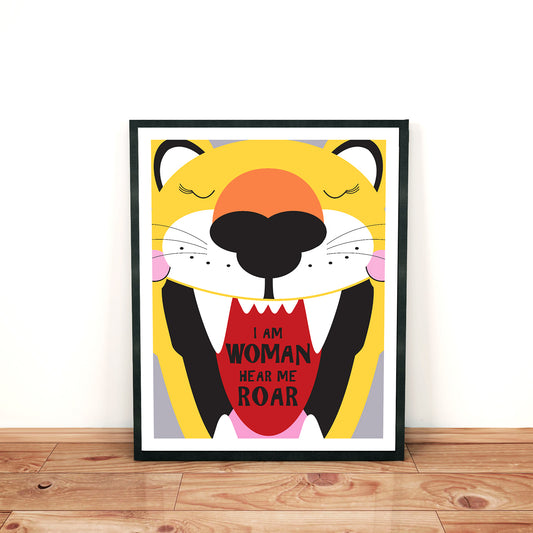 print of a lioness head with "I am woman hear me roar" in her mouth