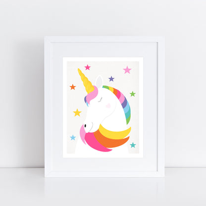 unicorn illustration in rainbow colours and a scattering of stars