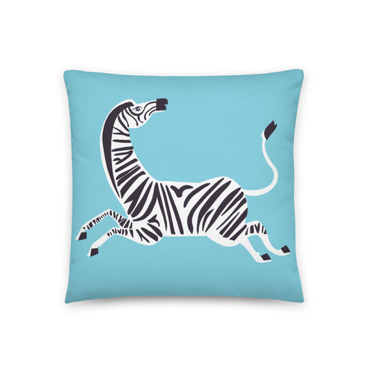 vibrant cushion cover features a striking blue backdrop to a bold design of an zebra
