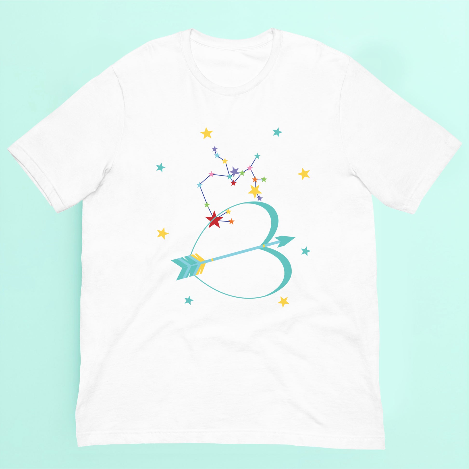 White t-shirt with colorful Sagittarius bow and arrow design on a turquoise background