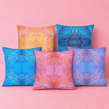 Colourful abstract mandala cushion covers featuring kaleidoscope inspired artwork in pink, blue, purple and orange for modern maximalist home décor.