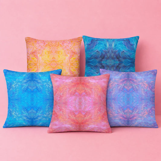 Colourful abstract mandala cushion covers featuring kaleidoscope inspired artwork in pink, blue, purple and orange for modern maximalist home décor.