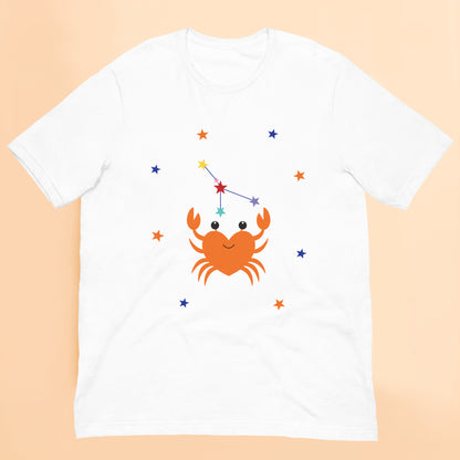 White t-shirt with a cancer crab and star constellation design on a peach background