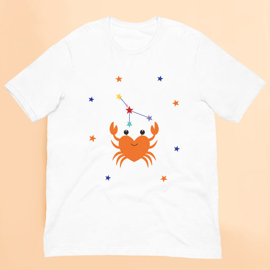 White t-shirt with a cancer crab and star constellation design on a peach background