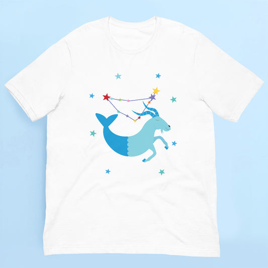 White t-shirt with a capricorn and star constellation design on a light blue background
