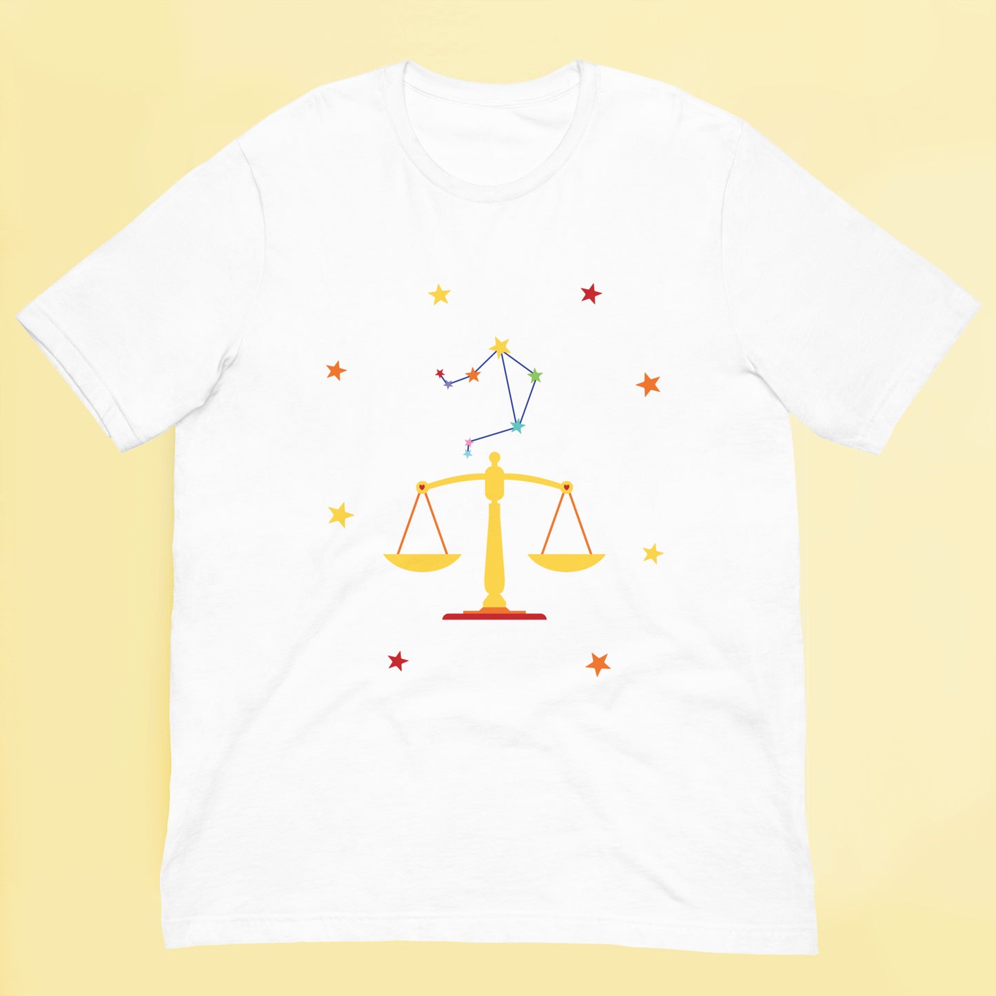 White t-shirt with Libra zodiac sign design on a yellow background