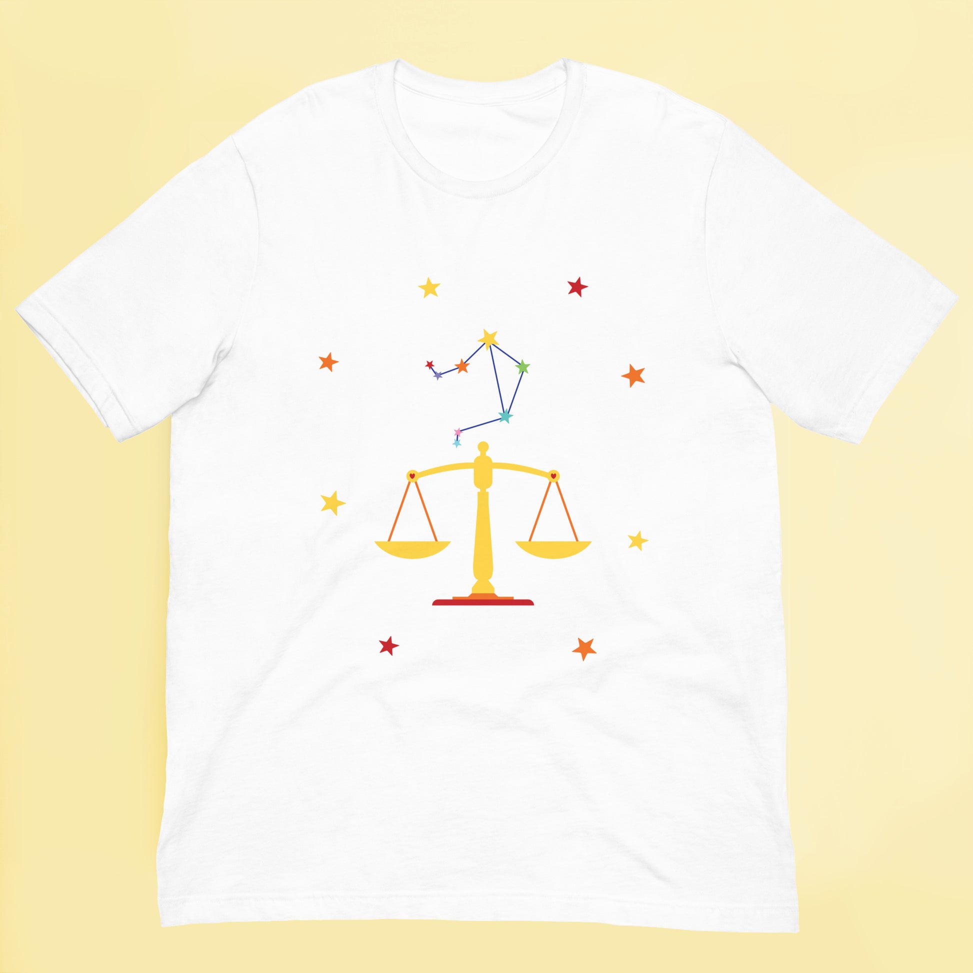 White t-shirt with Libra zodiac sign design on a yellow background