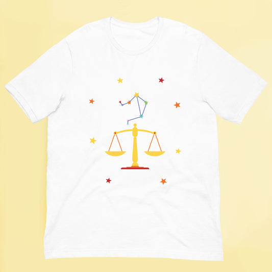 White t-shirt with Libra zodiac sign design on a yellow background