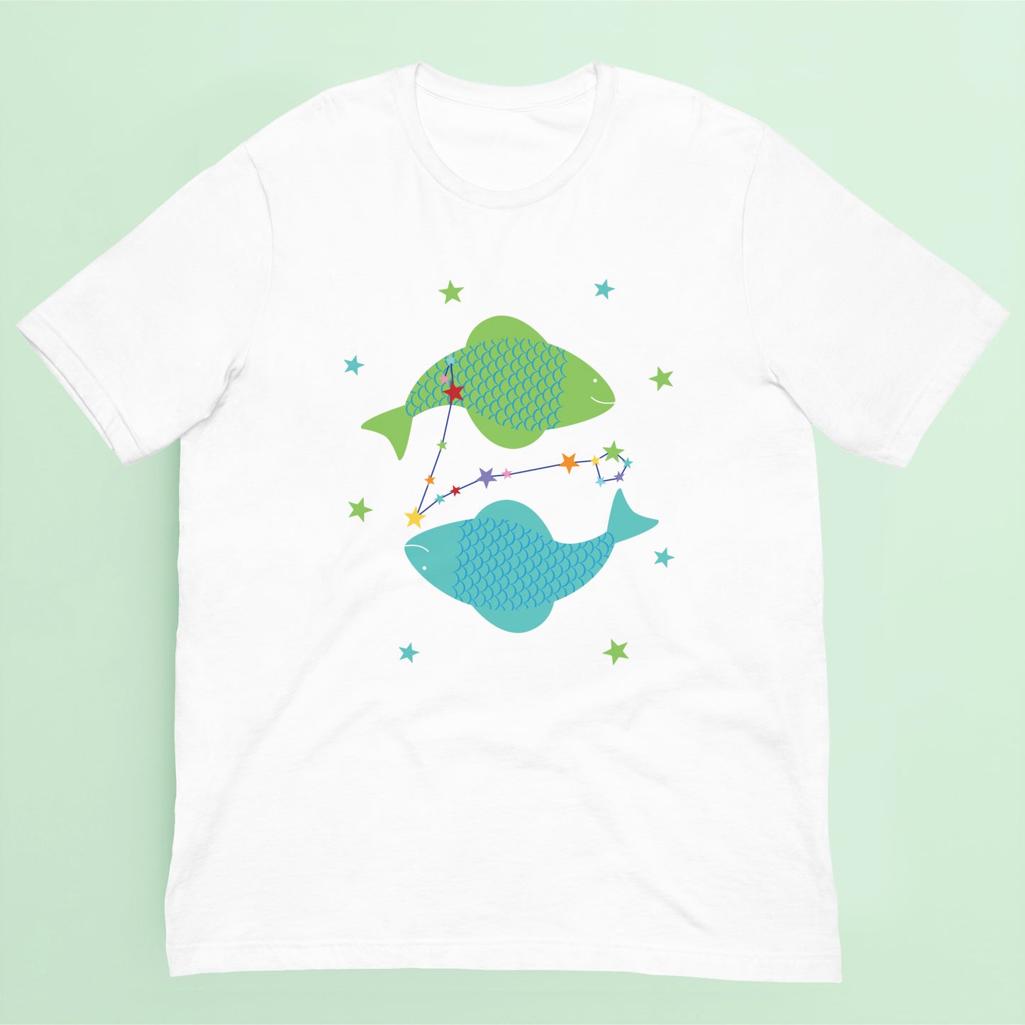 White t-shirt with green and blue pisces fish design on a green background