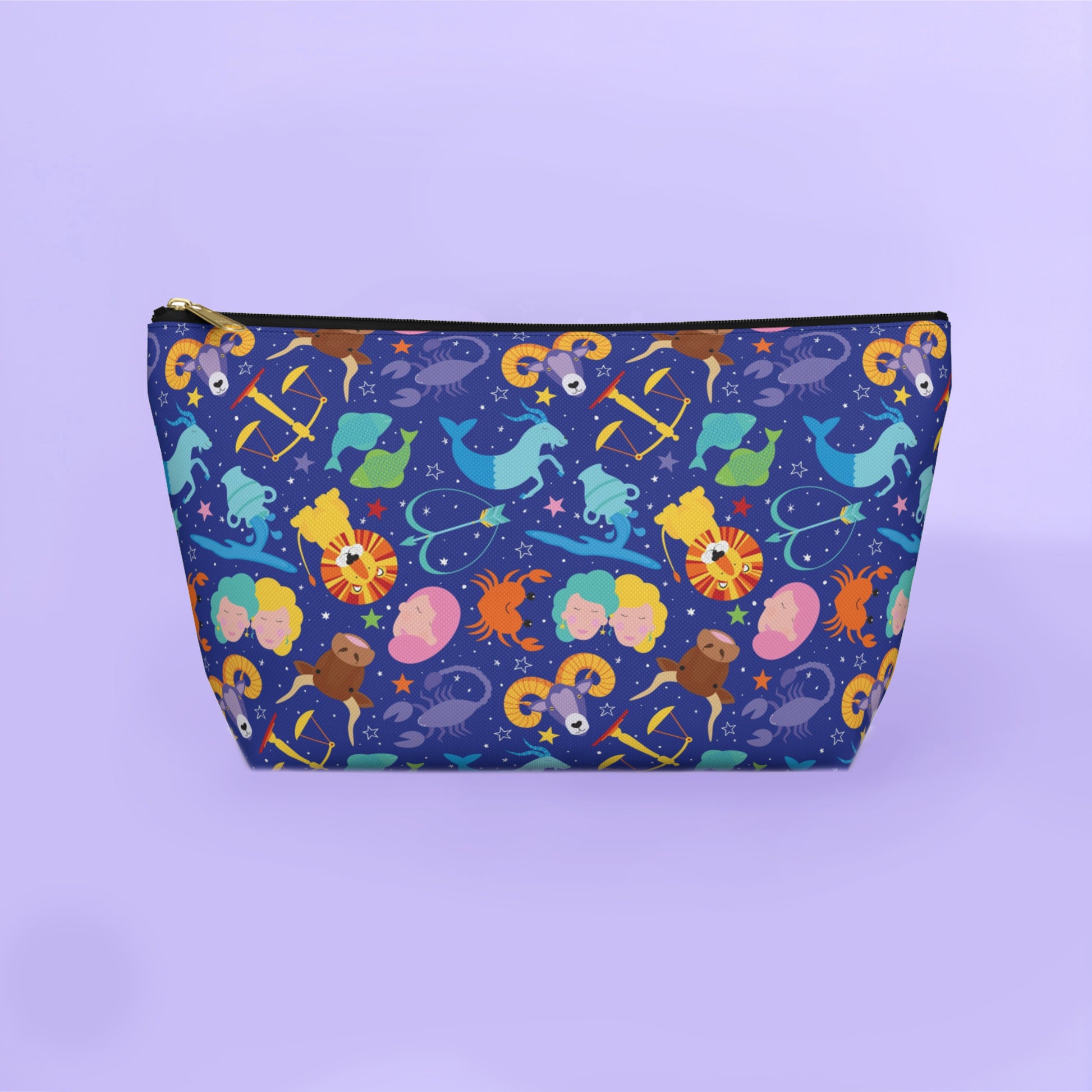 Colorful zipped pouch with astrological design on a purple background