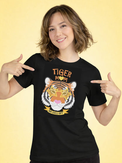 Woman wearing a black t-shirt with a tiger graphic and 'Tiger Mom' text on a yellow background