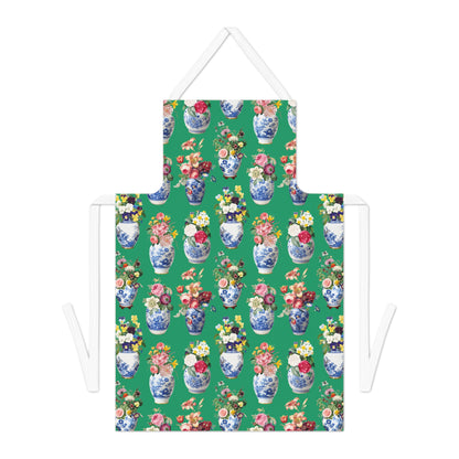 Green apron with floral and vase pattern on a white background