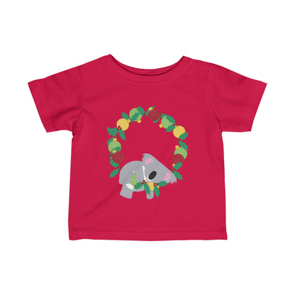 fun red kids Christmas t-shirt featuring an adorable koala peacefully napping on a Christmas wreath