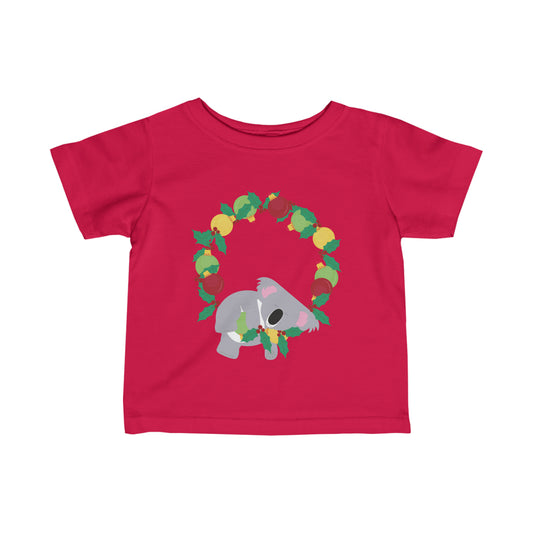 fun red kids Christmas t-shirt featuring an adorable koala peacefully napping on a Christmas wreath