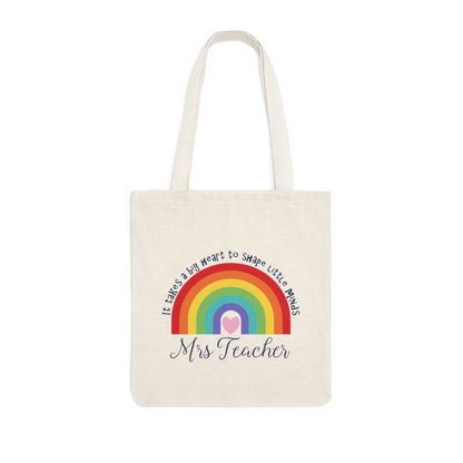 tote bag which has a rainbow and heart with the words 'it takes a big heart to shape little minds' and the teachers name underneath the rainbow