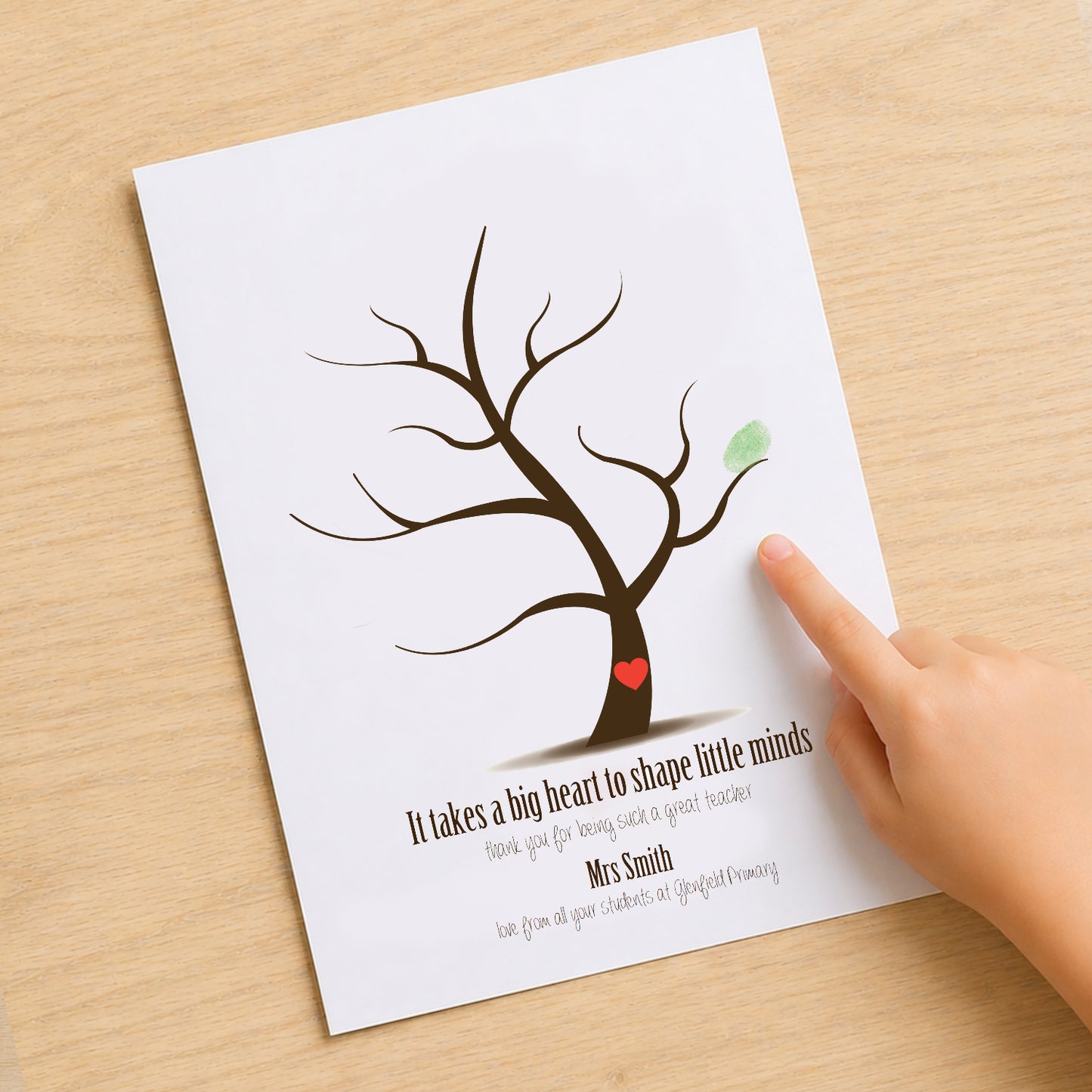 Teachers gift fingerprint tree design and heart being used by students