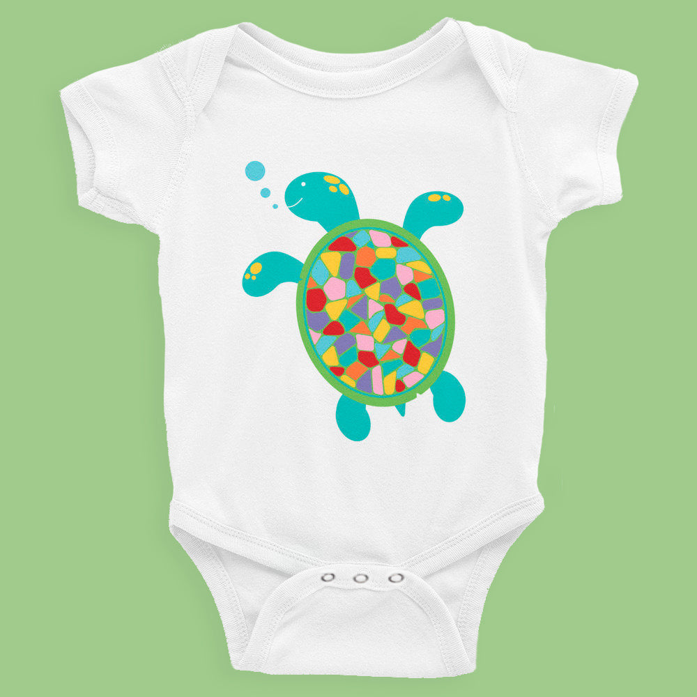 cute baby one-piece is designed with a fun and colourful swimming turtle design