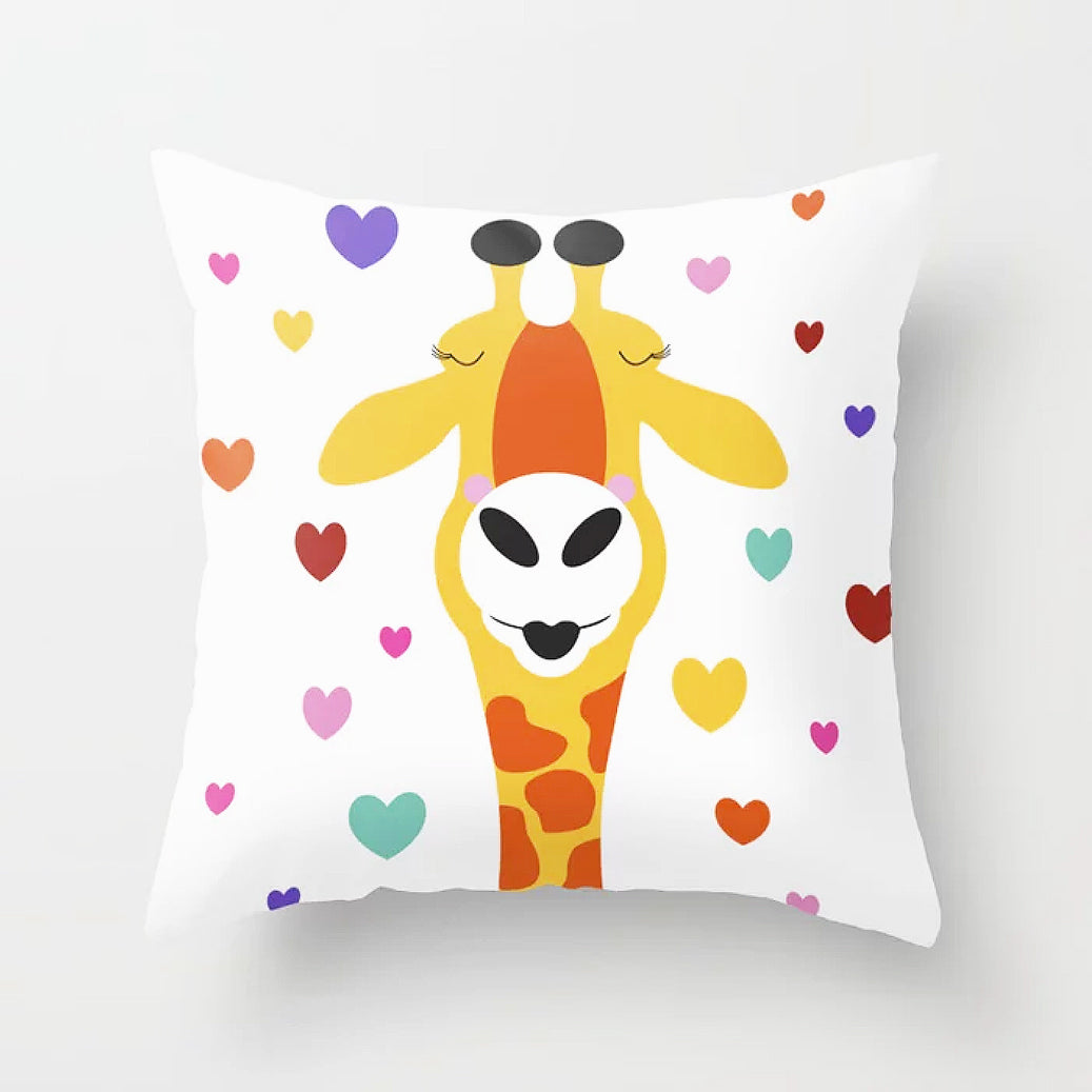 cute cushion cover with a kissing giraffe and scattering of love hearts
