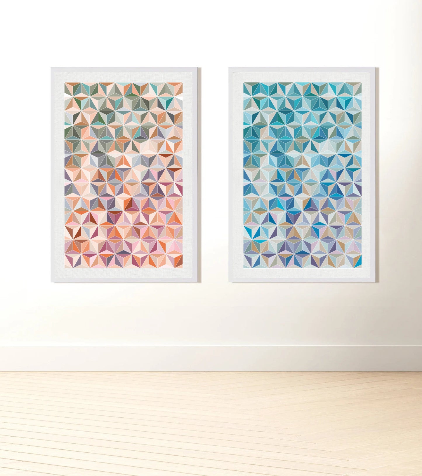 pattern prints of stars and cubes in two colour options - predominantly shades of blue or orange/pinks hanging on wall