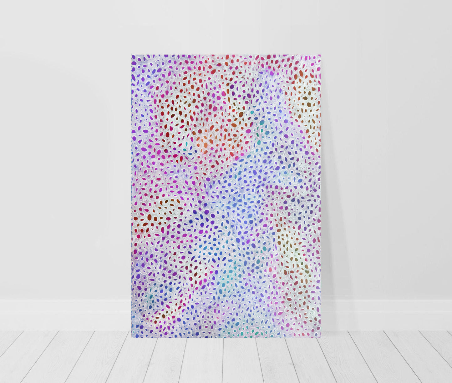 beautiful, colourful limited edition abstract print with rainbow colours leaning against a wall