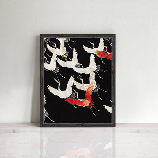 print of flying cranes on black background