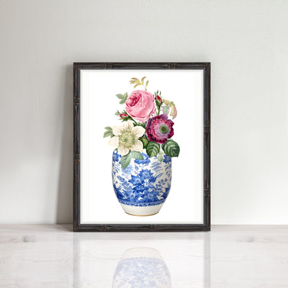 Print of a pink rose and anemone flowers displayed in a classic blue and white china ginger jar,