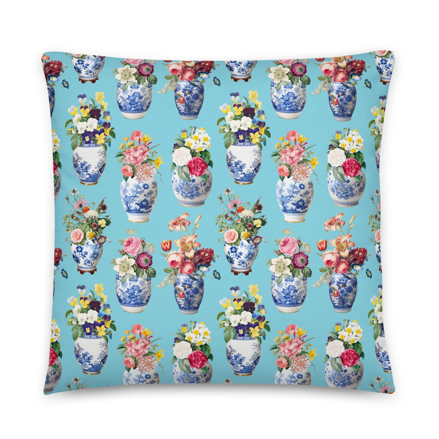 Pillow with floral and vase pattern on a blue background