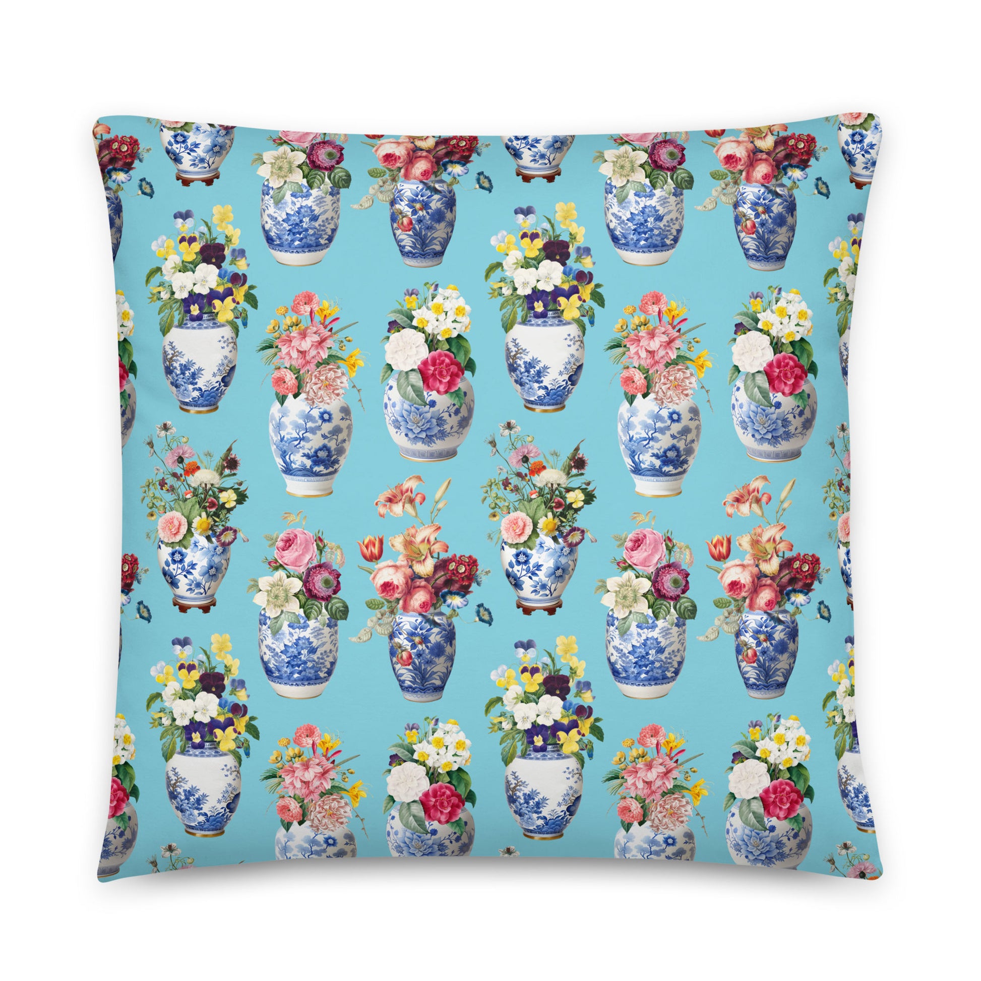 Pillow with floral and vase pattern on a blue background