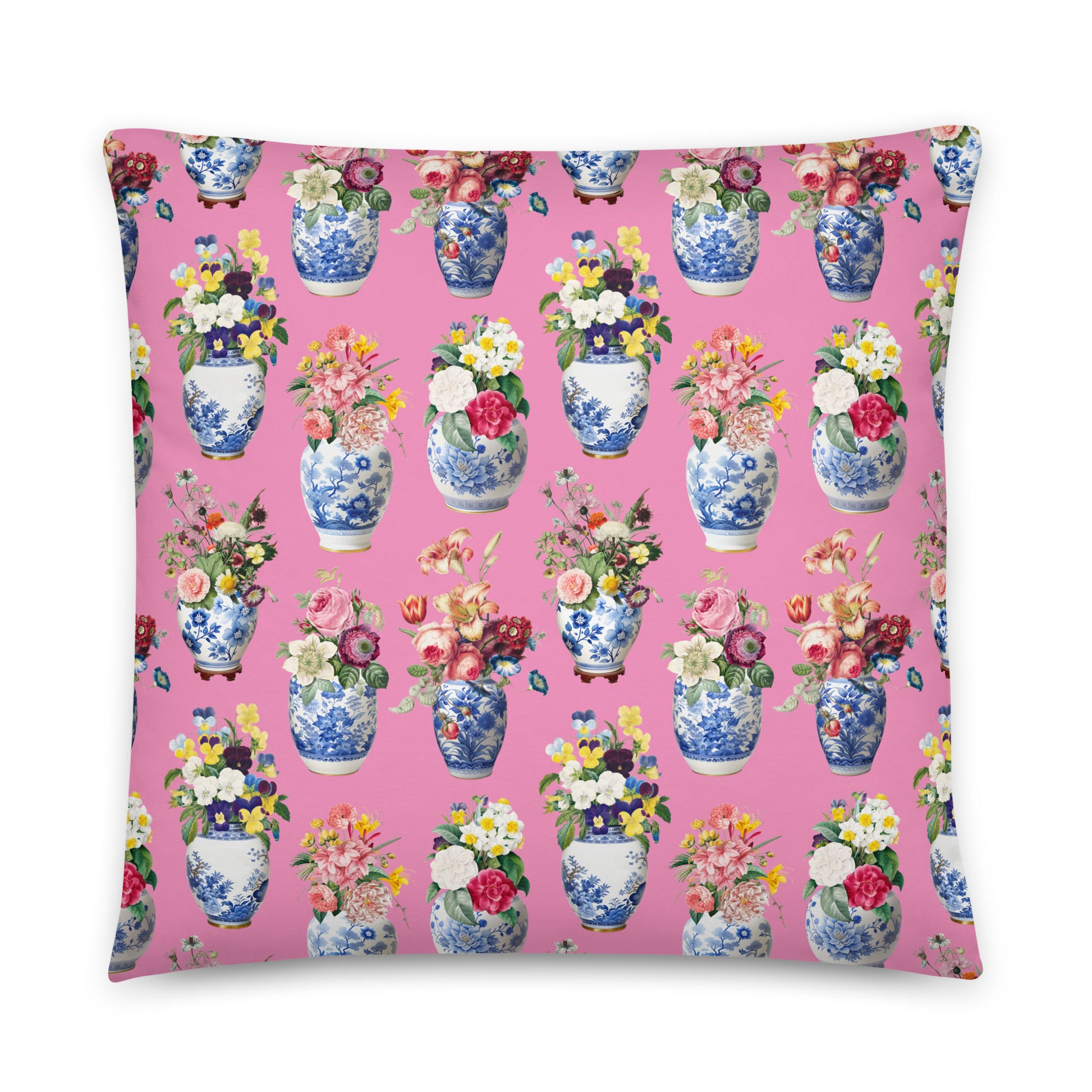 Decorative pillow with floral and ceramic vase pattern on a pink background