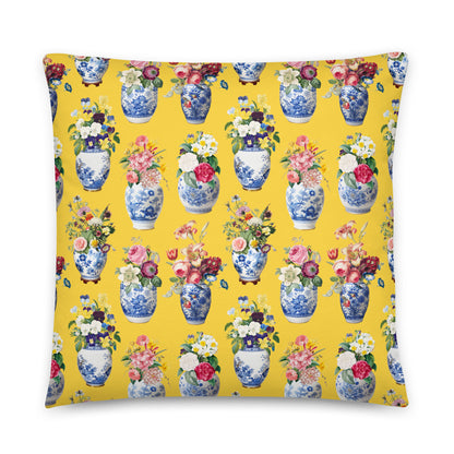 Pillow with floral and ceramic vase pattern on a yellow background