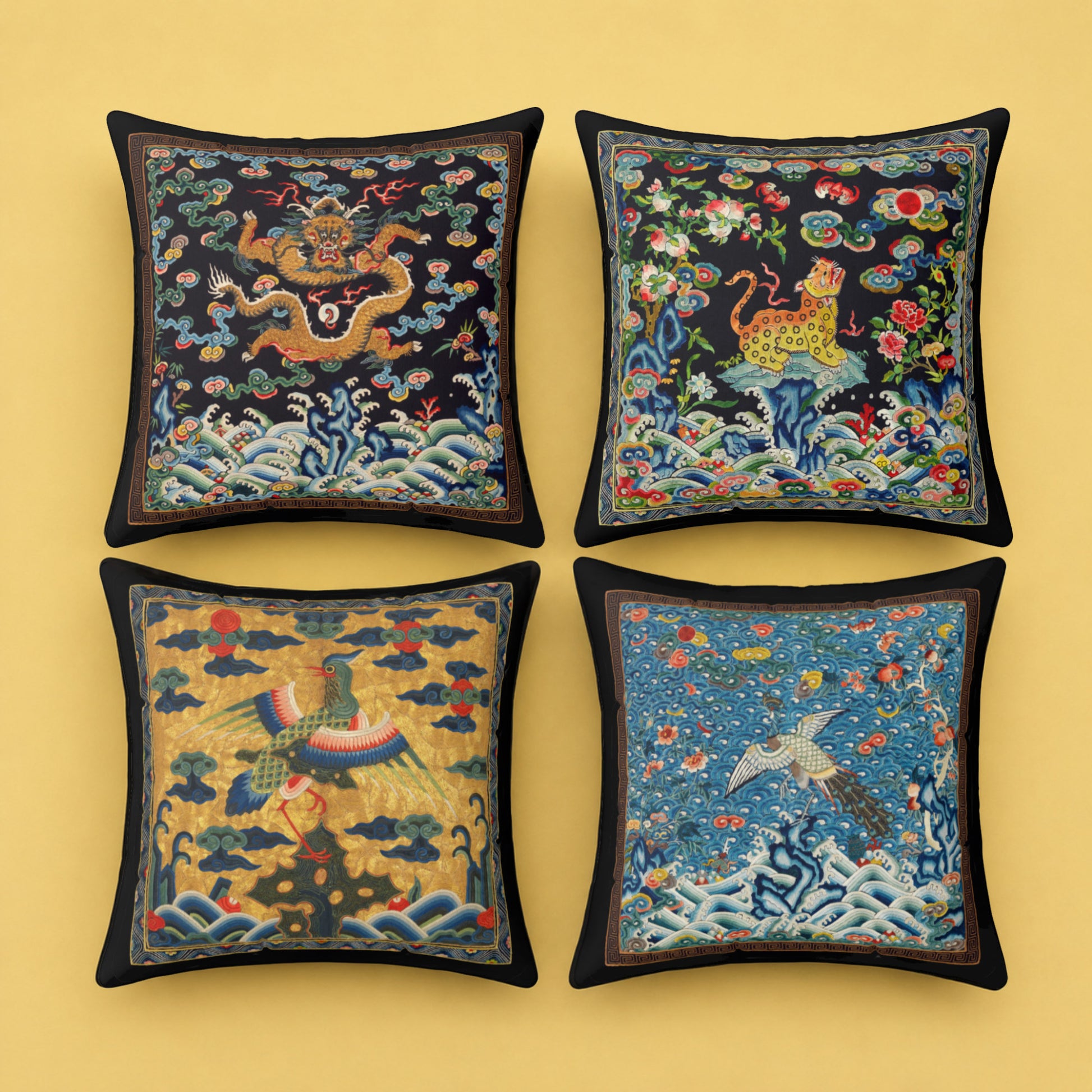 Set of four Chinese inspired decorative cushions with dragon, phoenix, tiger and crane designs on a mustard yellow background, styled as luxury maximalist home decor cushions with detailed textile inspired artwork.