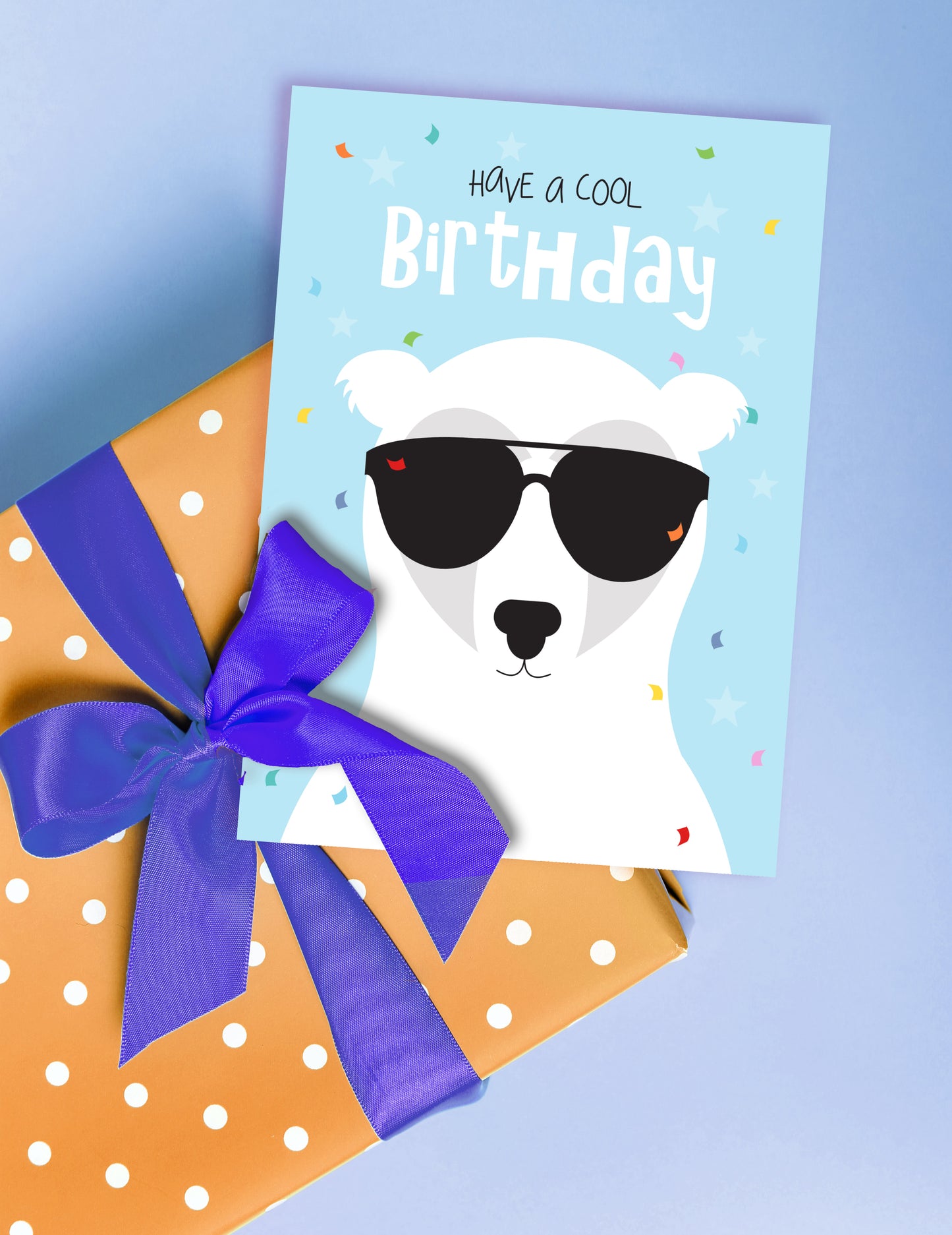 birthday card with polar bear sporting stylish sunglasses design sitting on gift